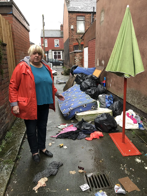 Image courtesy of By Charles Turner Jacke Pearcey with rubbish she has reported.