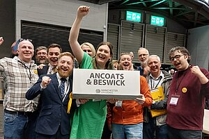 Manchester Lib Dems celebrating Cllr Chris Northwood's win at the count.