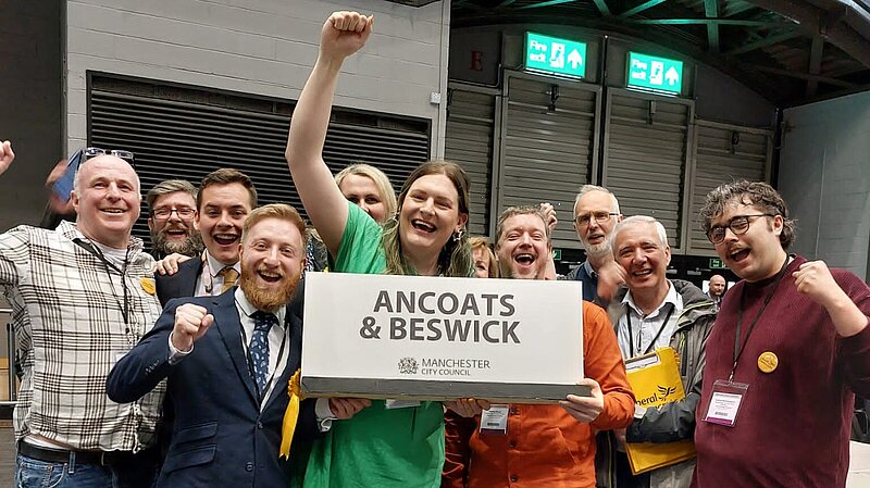 Manchester Lib Dems celebrating Cllr Chris Northwood's win at the count.